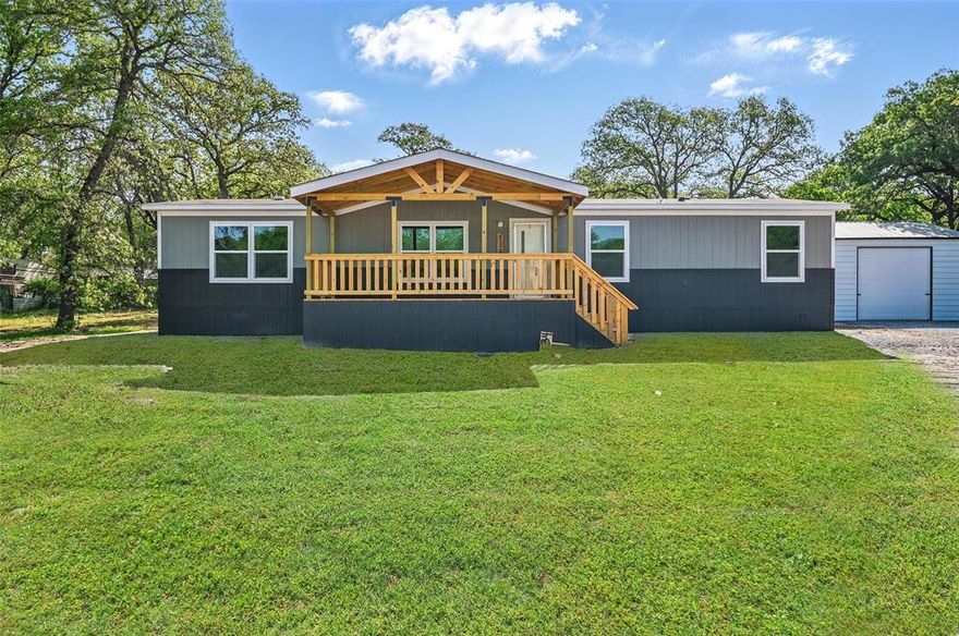 The 25x20 Shop add tons of space for your workshop! Enjoy the perfect blend of modern living and wide-open space with this brand-new manufactured home situated on a spacious 0.8-acre lot in charming Azle, TX. This move-in-ready home offers the peace and privacy of country living while still being conveniently close to shopping, dining, and schools. Inside, you'll find a bright and functional floor plan featuring four generously sized bedrooms, two full bathrooms, and an open-concept living, dining, and kitchen area—ideal for both everyday living and entertaining. The stylish kitchen comes equipped with brand-new appliances, ample cabinet space, and a center island that doubles as a breakfast bar. The primary suite includes a large walk-in closet and a private bath with tons of space, sink and a soaking tub with shower. Secondary bedrooms are well-sized and share a full bath. Step outside and take in the views—this oversized lot offers endless potential for gardening, or simply enjoying the extra room to roam. With no HOA and plenty of space to make it your own, this property is a rare find! Covered front patio is perfect for morning coffee or enjoying the evening air. Whether you're a first-time buyer, looking to downsize, or want more land to enjoy, this home checks all the boxes. Schedule your showing today! Some photos are AI enhanced