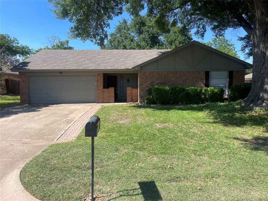 Charming 3 bedroom, 2 bath home located on a spacious oversized lot towards the end of the street. This well maintained home features vaulted ceilings, fresh neutral paint, and an inviting living area with a brick fireplace. The kitchen offers stainless steel appliances, ample cabinet space, and an open flow perfect for everyday living. Large fenced backyard with mature trees to provide plenty of shade. Spacious backyard includes a large storage building. Conveniently located near shopping, dining, and schools.