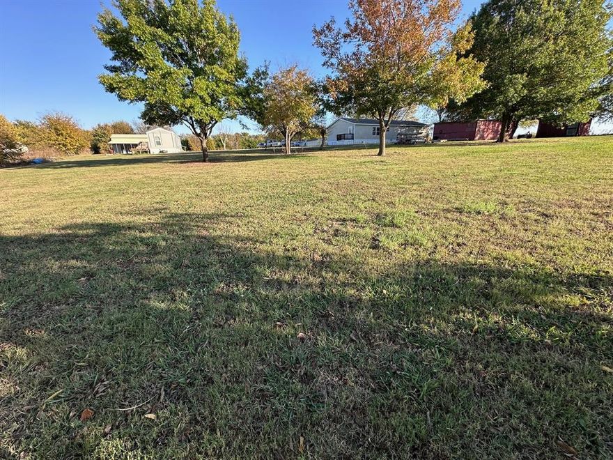 No HOA Anna. Looking for family retreat? Mother in law suite? Home with business on site? Combine these 2 1.2 acre lots to create your paradise! Lot 1 MLS 21107271 $235,000 3bed2bath mobile home with large screened in porch. Well not active can be used for out door purposes. Home is on city water. Plus carport. Multiple out buildings waiting for you to complete their design. Shop or animals? Drive will need to be added if selling separately.