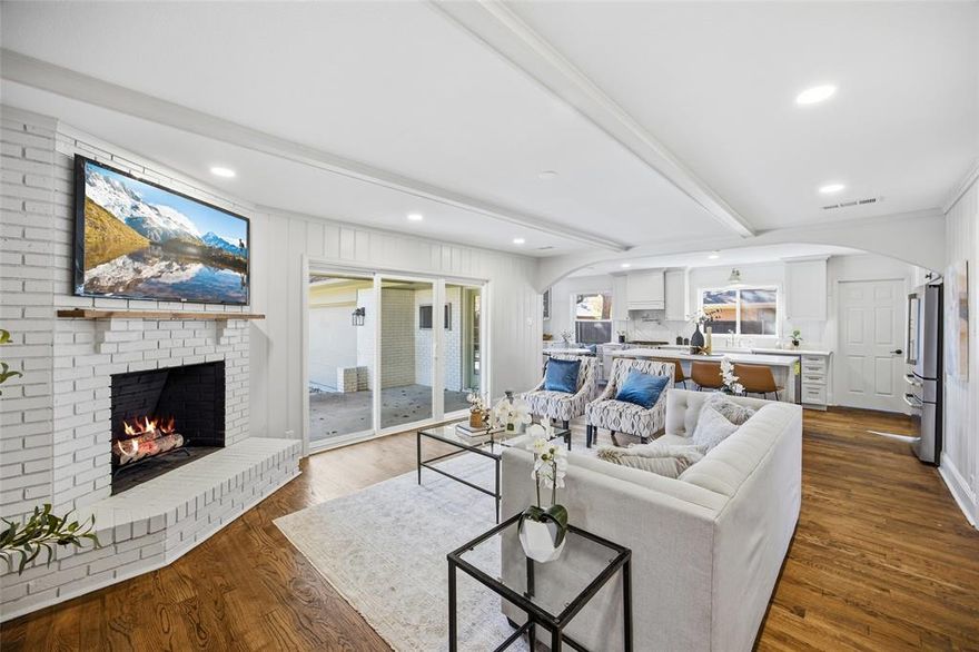 Nestled in the heart of Caruth Meadows, this beautifully renovated East Dallas charmer blends timeless character with modern comfort. Painted brick, updated windows, and an extensive list of upgrades create peace of mind and lasting value. Inside, rich hardwood floors, abundant natural light, and an open, inviting layout set the tone for effortless living. The kitchen features quartz countertops, stainless steel appliances with gas range, custom soft-close cabinetry, farmhouse sink, and a charming breakfast area with glass-front uppers. It opens seamlessly to the family room with decorative beams, wood-burning fireplace, and sliding doors to a covered patio and expansive backyard. Architectural details like pocket doors, curated shelving, and a recessed niche add distinctive East Dallas charm. The primary suite offers a relaxing retreat with a well-appointed bath featuring a frameless shower, rain showerhead, elegant vanity, and spacious walk-in closet. Additional highlights include a dedicated office, laundry center, mature trees, and generous .23-acre lot. Located within Dan D. Rogers Elementary and minutes to Park Cities, SMU, White Rock Lake, Central Market, and all that East Dallas has to offer.