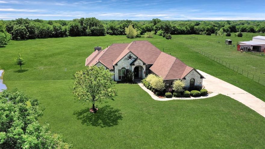 FALL LEASING SPECIAL APPLIES!!!
Welcome to the country! Room to roam in this gorgeous Texas Hill Country style one story stone home on 4 plus acres will charm you with its many amenities including hand scraped hardwood floors running throughout most of the living areas. Open floor plan features chef's dream kitchen opening onto breakfast and family room. Inviting family room includes vaulted ceiling, floor to ceiling Austin stone fireplace with hewn mantle, and windows providing ample natural lighting. Owner's suite includes bedroom with beautiful stone fireplace opening onto spa style master bath. Auxiliary bedrooms open onto full baths and are complete with spacious closets.Second living area can double for home office. Roomy 3 car garage opens onto extended drive with space for ample parking for family and friends. Huge patio is perfect for entertaining and enjoy rural views. Located in established neighborhood near great schools. Don't miss this one!