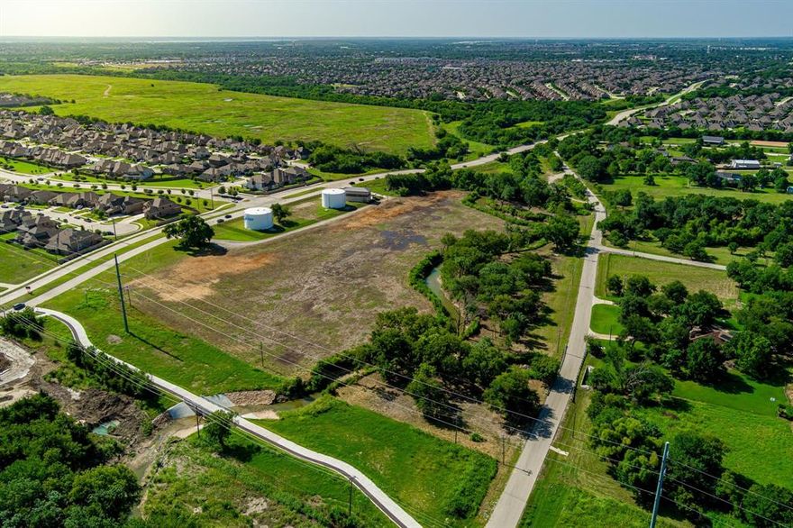 Discover a truly unique opportunity: 11 sprawling acres right in the middle of town, offering the best of both worlds – serene natural surroundings and unbeatable convenience. Mature trees create a private, park-like setting, while the property’s generous acreage is zoned for horses, making it an ideal haven for equestrian enthusiasts or anyone seeking wide-open space without sacrificing access to city life.

Just minutes away, you’ll find a wide array of retail (Target), grocery stores (HEB), and dining options, from casual cafés to favorite restaurants, putting everything you need right at your fingertips. Whether you’re envisioning a private retreat, a working hobby farm, or a multi-family or commercial development opportunity, this property offers unmatched potential.