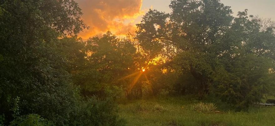 Build your dream home on this picturesque 1.84-acre lot, featuring an easement in place for well and septic. Nestled in a beautiful, established neighborhood of large custom homes, this property offers rolling topography, mature trees, and access to Cross Timbers Golf Course.  A residential lot that is perfect for those seeking space, privacy, and scenic surroundings. Enjoy the peaceful setting with no city taxes, while still being part of a desirable community. A rare opportunity to create a custom retreat in an exceptional location.