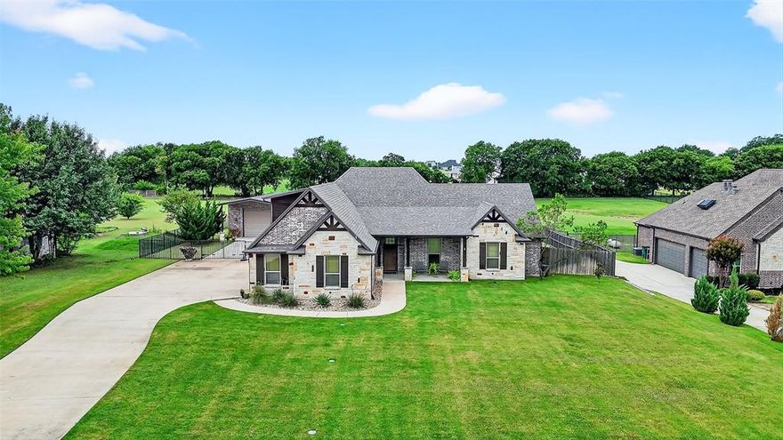 Welcome to your own little slice of heaven just in time for the holidays!  Already decorated.  Custom Christmas lights convey with property. Outside City Limits, NO CITY TAXES, underground utilities, within prestigious Gunter ISD.   Inside you are greeted by the magic of Christmas complete with a spacious foyer, mud room, open concept kitchen, living and dining room absolutely perfect for entertaining everyone.  Reinforced storm shelter under stairs.  Private office. Propane tankless water heater.  Concrete floors throughout main living areas.  Carpet in bedrooms & stairs. Bedrooms and bathrooms downstairs, except for upstairs bonus room, currently being used as 4th bedroom, could also be used as a media room, game room, or additional office space with opportunity to expand the space.  Private primary suite flows effortlessly to ensuite bath, walk-in shower, fantastic his and hers closet with access to the laundry room featuring ample built in storage, countertop and drip dry rack making laundry a breeze.  Two generous sized bedrooms with walk-in closets and bath on opposite side of home.  Powder room off living room with perfect proximity to patio.  Tinted sliding glass doors open completely to take full advantage of the patio on those perfect spring days and cool fall nights for indoor outdoor living.  There is no better place to enjoy a beautiful North Texas sunset than this patio! Just beyond the patio you will enjoy the sparkling pool, fully fenced backyard with electric gate, and when you've had enough sun, the porch on the front of the shop offers plenty of shade with a driveway perfect for cornhole while keeping your eyes on the kiddos in the pool.  The newly built shop, 2022, is constructed of structural steel, metal building with brick facade all round, easily stores 2 additional vehicles, lawn equip, boat or RV, has 14' OH doors on both ends for easy access, spray foam insulation and elecricity.