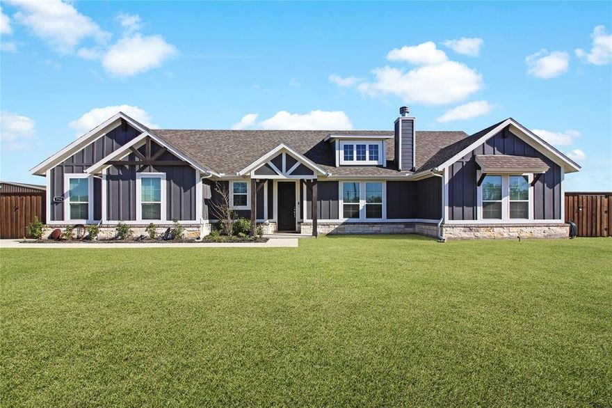 Welcome to this one-owner home built in 2023, where modern comfort meets peaceful country living on .814 of an acre in Oak Ridge! This beautifully maintained property truly feels like new and is 100% move-in ready.  Step inside to an inviting open-concept layout where the kitchen, living, dining, and entry flow seamlessly together, perfect for everyday living and entertaining. The kitchen is a standout, featuring rich dark wood cabinetry, granite countertops, white tile backsplash, built-in oven & microwave, cooktop, and a large island with additional seating. You’ll also love the under-cabinet motion lighting that adds both function and style.  The living room offers a cozy corner wood-burning fireplace and gorgeous wood flooring that carries throughout the main areas, creating a warm and welcoming feel.  The spacious primary suite is privately located on one side of the home and features a luxurious en-suite bath complete with dual sinks, soaking tub, separate shower with bench seating, and a large walk-in closet. The laundry room is thoughtfully designed with a utility sink and space for hanging clothes.  On the opposite side, you’ll find three generously sized bedrooms and a secondary bathroom with double sinks, making it ideal for family or guests.  This home is loaded with extras, including spray foam insulation for energy efficiency and a built-in pest control system, allowing for easy, in-wall treatment access.  Step outside to enjoy the fully fenced backyard with a new board-on-board fence and electronic gate, offering both privacy and security. With plenty of space, you’ll have room to add a shop, pool, or create your dream outdoor oasis, perfect for entertaining or relaxing with family.  Located just minutes from I-20, this home offers the perfect blend of convenience and country charm.  Immaculately maintained, practically brand new, and ready for its next owners, this one checks all the boxes!