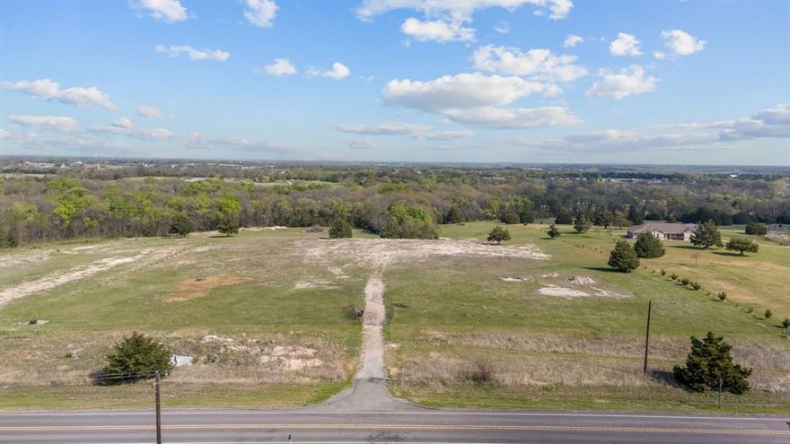 Discover an exceptional opportunity to own 11 acres of pristine Texas land in the heart of Anna, one of North Texas’ fastest-growing communities. This stunning unimproved tract offers the perfect blend of peaceful country living with convenient access to modern amenities.
A rare AG exemption is already in place, providing significant tax savings & long-term value, an incredible advantage for buyers looking to invest or build their dream estate.
Extensive improvements have already been completed, including over $100K in professional dirt work, saving you both time & expense. A large, elevated house pad is already in place approximately 300 feet from the road, offering an ideal homesite with added privacy, scenic views, & a head start on construction. This property is truly build-ready.
The land itself features a beautiful mix of open space, mature trees, & a seasonal creek running through the trees in the back, giving you flexibility for a custom home, recreational use, or a private retreat.
Located just minutes from the conveniences of Anna, you’ll enjoy a growing community known for its small-town charm, excellent schools, & expanding retail & dining options. Just 1 mile from Hwy 121 & 3.5 miles from Hwy 75, commuting to nearby hubs like McKinney & the greater DFW metroplex is seamless.
Whether you’re looking to build now or invest for the future, this property offers unmatched potential, valuable improvements, and a prime location in a rapidly developing area.