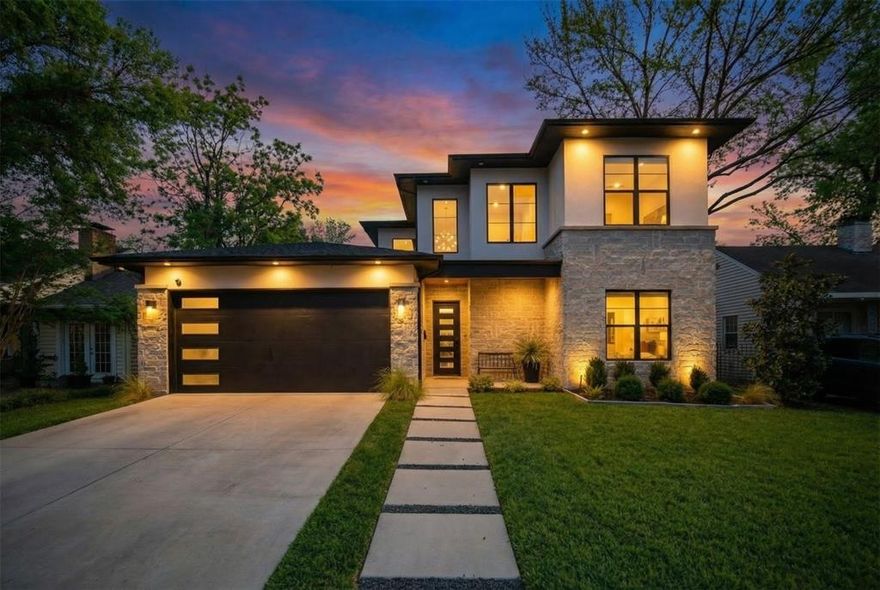 Exceptional contemporary home located in the sought-after Old Lake Highlands neighborhood, just a short walk from White Rock Lake. This light-filled residence features dramatic soaring ceilings, crisp white walls ideal for showcasing art, and gorgeous wood flooring throughout. The open-concept layout seamlessly connects the main living spaces to a spacious, tree-lined backyard—perfect for indoor-outdoor living. The chef’s kitchen is a true centerpiece with site-built custom cabinetry and KitchenAid commercial-grade appliances. High-end, cutting-edge designer finishes are thoughtfully integrated throughout the home. A first-floor media room offers flexible living or entertainment space, while the second-story loft provides an open overlook to the main living area. Abundant windows flood the home with natural light. Additional highlights include an electric vehicle charging outlet and a pool-sized backyard. A rare opportunity in one of East Dallas’ hidden gems. Short walk to Hexter, St. Johns and retail.