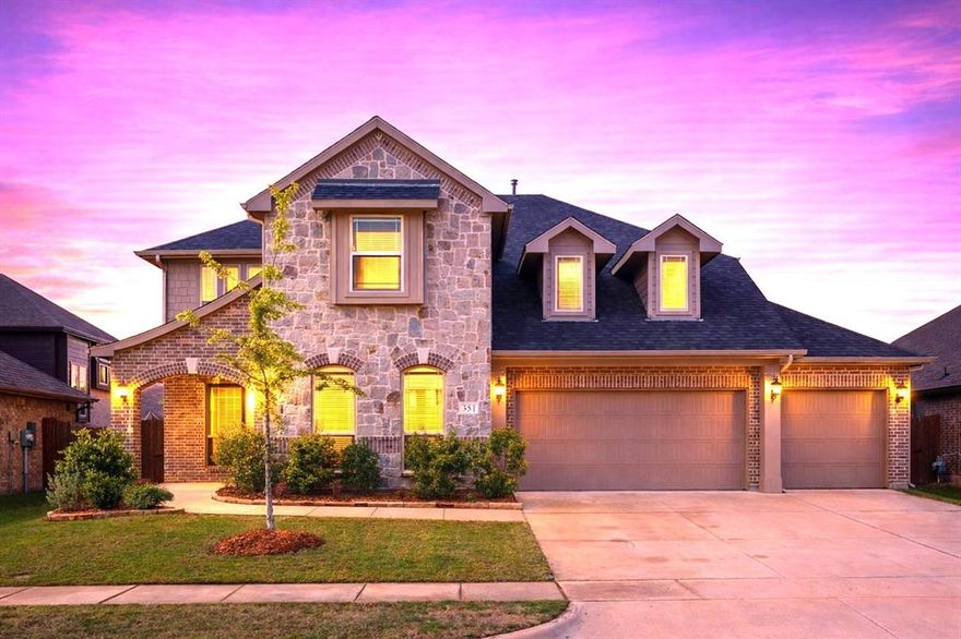 Gorgeous modern home that reimagines traditional design with a chic, contemporary flair—featuring light blonde Trinket Oak floors, crisp pure white shaker cabinetry, and elegant white quartz countertops throughout and a Nature's Home air purifier system. The spacious kitchen with built-in stainless steel appliances opens seamlessly to an expansive family room, highlighted by a stunning floor-to-ceiling stone fireplace. A front office has been thoughtfully converted into a fifth bedroom, complete with convenient access to a full bath featuring a walk-in shower—perfect for guests or multigenerational living. Designed for both everyday comfort and exceptional entertaining, this home offers 30-solar panels, a 26-foot covered patio, a game room, and a bi-level media room—ideal for hosting unforgettable gatherings. Situated on an oversized pie-shaped lot with a three-car garage, the property also boasts a breathtaking primary suite with a spa-inspired bath retreat. Additionally, enjoy the incredible community amenities including swimming pools, playgrounds, walking trails, a dog park, pickleball courts, frisbee golf, fitness centers, a stocked fishing pond, and basketball courts—all within walking distance.
