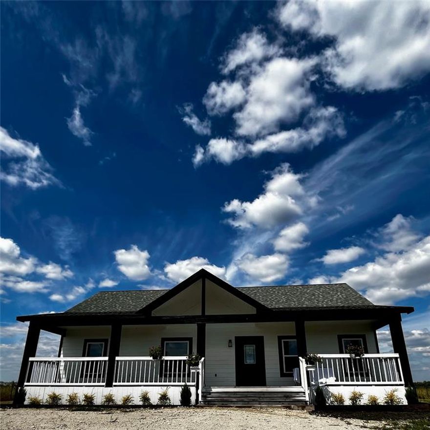 Welcome to this beautiful brand-new 2025 modern farmhouse located in Kerens, Texas. This thoughtfully designed 3-bedroom, 2-bath home sits on just over an acre, offering the perfect balance of modern comfort and peaceful country living.

The home features a covered front and back porch, ideal for enjoying quiet mornings or relaxing evenings with views of your private, fenced property. A gated entry adds charm and character to the setting. Inside, the home is built with careful attention to detail—featuring an open, modern layout, quality finishes, and plenty of natural light.

The kitchen comes fully equipped with all new appliances, while the bathrooms include soaking tub and a separate walk-in shower for convenience. Every space has been designed for functionality while maintaining the warm, inviting feel of a farmhouse.

Living in Kerens means enjoying the best of country life—peace, privacy, and wide-open spaces—while still being within reach of nearby towns and amenities. Whether you’re looking for a place to unwind or room to grow, this property offers a lifestyle that’s hard to find.