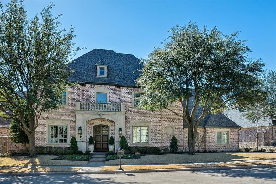 Charming five bedroom, five full and two half bath home in the gated neighborhood of the Villages of Stonebriar Park with lake views on a greenbelt. You're greeted with beautiful wood flooring throughout the first floor of the home. Enter the foyer through double doors and head straight to the sophisticated study that features a woodburning fireplace, built-ins, and panel walls. The formal dining room offers a walk-in climate controlled wine cellar. The den offers a wall of windows that bring in natural light and a door that leads you to the side patio, cathedral ceilings, and opens to the kitchen. Elevator! The gourmet kitchen features an oversized kitchen island, granite countertops, stainless-steel appliances, and a door to the patio. The secondary rooms include one downstairs bedrooms, three upstairs bedrooms, a game room, and media room. Enjoy the views of the lake from the comfort of the side covered patio.