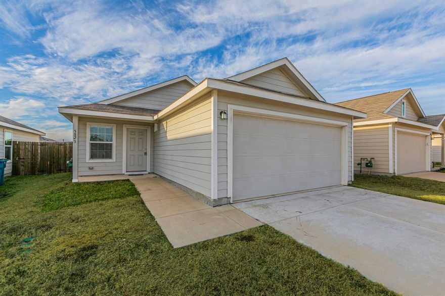Move-in ready 2021 home featuring an open floor plan, attached garage, and backyard shed for added storage. Manageable yard and smart layout offer comfort and convenience in a desirable Forney neighborhood.