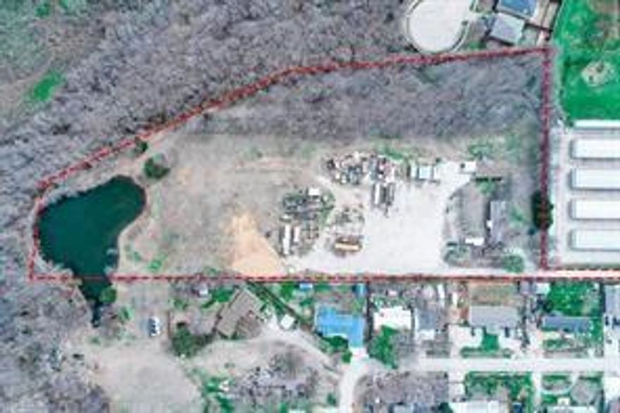 Currently zoned Light Commercial (LC) and Buyer should confirm future zoning and restrictions. Great opportunity to purchase over 5 acres in prime location inside Little Elm city limits ideal for storage facility, warehouses, truck parking, or single family development.  Large stocked with fish pond located on the property that would be great for RV Park amenity.