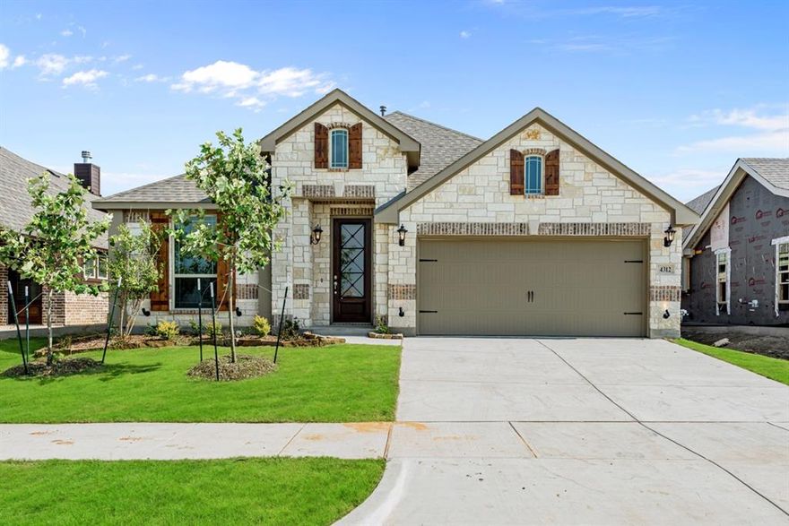 New Construction Ready for Closing! Live the 'Silo Mills Lifestyle' which includes an on-site Elementary School & future resort-style swimming pool, grand entertainment complex & much more! This Cypress II plan by Bloomfield Homes features a stunning brick & stone exterior with a stately 8' tall Mahogany & glass front door and a large backyard with a Covered Back Patio & Gas Drop for your grill. Transitional gray color palette includes a mosaic tile surround on the Fireplace, Wood-look Tile flooring, plush carpet in bdrms & Game Room, gorgeous Exotic Granite tops in kitchen with an extra large island & spacious walk-in pantry, and Quartz tops & Upgraded Tile walls in all baths. The 1st-floor Primary Suite was designed for relaxation with a window seat, seating area, and an Oversized Shower with seat & dropped tile floor. 2in Faux wood blinds, full rain gutters, smart home features, metal fence backing up to a greenbelt & much more. Visit Bloomfield's nearby model to learn more!