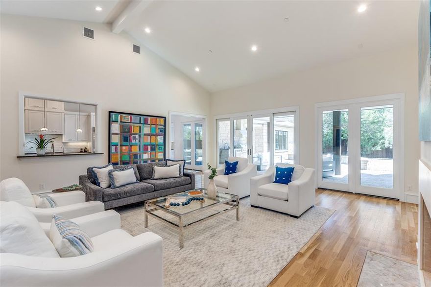 Spectacular one and one half story home on a .647 acre in Preston Hollow.  Complete with 5 bedrooms, 5.1 baths, library, formal dining and living, cozy family room, upstairs and downstairs flex rooms, wine closet, outdoor kitchen under a covered patio with a fire pit.  The primary bedroom with en suite marble bath is exquisite. The bathroom has dual vanities, two separate showers, jetted tub, with hand-held and large walk-in closet, coffee bar and beverage center with mini-refrigerator, dual head shower with rain shower head and hand-held. 

All main living areas are surrounded by a wall of windows allowing the outside in and creating an atmosphere of expansiveness.  The gourmet kitchen is complete with a sub-zero refrigerator, freezer, wolf range with 6 gas burners, gridle and pot filler, large center island, dual Bosch dish washers, 2 dual Wolf ovens, 1 convection oven, eat in kitchen breakfast room.  Conveniently located in the private school corridor within close proximity to fine dining and shopping.