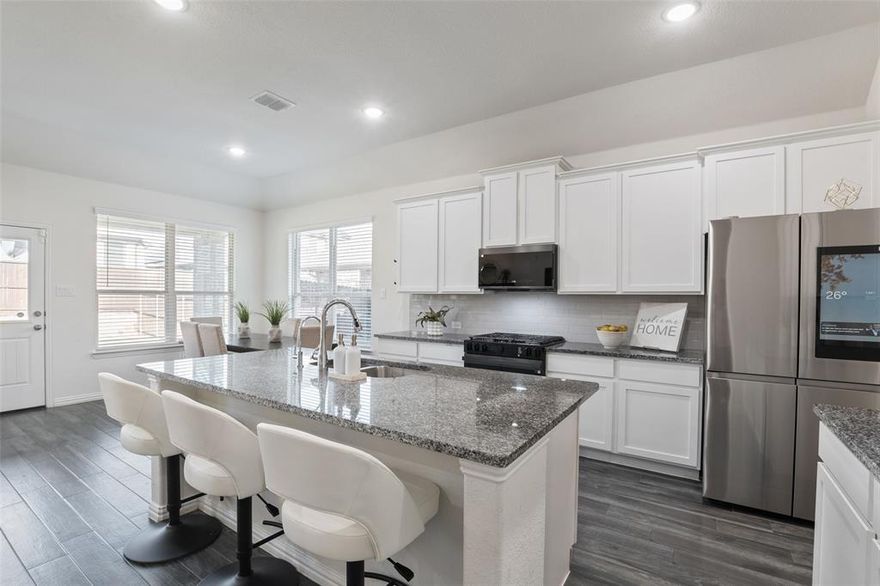 Move-In Ready: Durable, ceramic wood-look tile throughout common areas and a bright, open-concept kitchen featuring elegant granite countertops and crisp white cabinetry. Flexible Living for Your Future: The versatile layout includes a first-floor primary suite for your own private sanctuary, plus a first-floor guest room—perfect for a home office or roommates to help with the mortgage. Space to Grow: Upstairs, you’ll find two more bedrooms and a Jack-and-Jill bath, alongside a family and media room. It’s the ultimate setup for movie nights or hosting friends without outgrowing your home in a few years. Community Perks Included: You’ll have access to a community pool and playground, giving you resort-style amenities without the maintenance. Plus, you're minutes from Little Elm Park & Beach on Lake Lewisville.