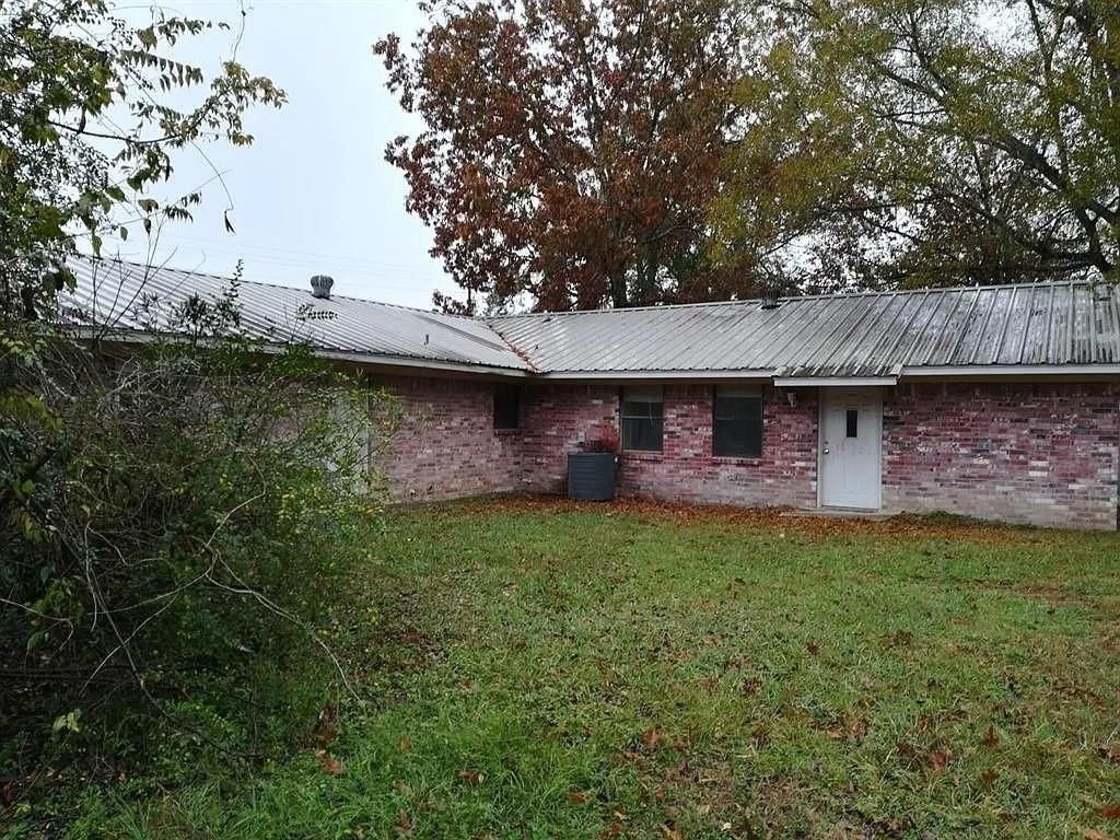 Photo of 1214 Martin Luther King Drive, Livingston, TX 77351 (MLS # 21157628)