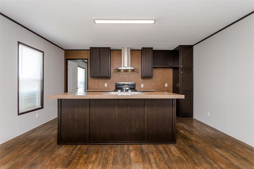 Move right in with a 0 down loan available on this move in ready home. Current monthly lot rent of 623 a month. Keep it here and pay lot rent or move it to your own land. Such a low price for homeownership! Adorable upgraded finishes inside and a great floor plan with lots of closet space make this home feel much bigger than it is. Parking spaces are very close. This sale does not include land just the home, land is leased monthly. Quiet community with pool and central location right off 35 with quick access to anywhere. REO property in excellent condition, perfect for investors or first time buyers but with minimal to no work required.