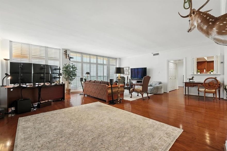 Luxury high-rise resort style living - Newly renovated - Move-in ready! This beautifully upgraded home features two spacious bedrooms, two full bathrooms, an open floor plan, a formal dining room, and spectacular unobstructed east-facing views. Bathed in natural light, the interior features elegant plantation shutters, crown molding, fresh Sherwin-Williams paint, hardwood floors, and Berber carpet in both bedrooms. The bathrooms feature custom wood vanities, sleek flat walls, and Delta fixtures. The updated kitchen is a beautiful blend of style and function, featuring custom wood cabinetry, Italian cracked-glazed subway tile and granite countertops. Step outside to an oversized balcony that provides the perfect spot to enjoy breathtaking sunrises and panoramic views. 

Significant upgrades for your comfort and peace of mind include a new 3-ton Trane HVAC system, PremierOne 24x7 air purifier, professionally cleaned ducts and vents, energy-efficient LED Lighting, Schlage Flair hardware on all doors, Schlage Encode Smart Wi-Fi deadbolt, Delta Faucets and InSinkErator Evolution Disposal. Unit also includes an additional 5 x 5 indoor storage unit and designated garage parking.

Amenities: 24-hour concierge, fitness center, walking track, indoor and outdoor pools, steam room, sauna, hot tub, EV charging, tennis courts, pickleball courts, and two community rooms for events. Prime North Dallas location with easy access to dining, shopping, and highways.