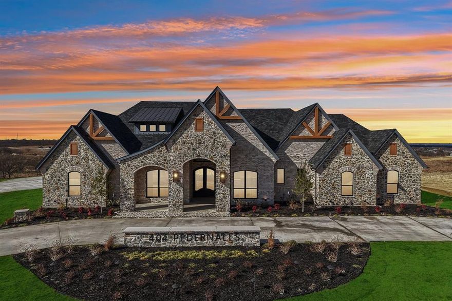 La Madera Luxury Ranch Estate - Aledo - CGP Custom Homes 

Located just outside Fort Worth in the prestigious area where Landman was filmed, La Madera is a remarkable luxury ranch-style home offering exceptional craftsmanship and attention to detail throughout. Set on 2 scenic acres with rolling, elevated terrain and breathtaking views, this 4,730-square-foot residence blends refined elegance with thoughtful functionality.

The home features five spacious bedrooms, each with its own en-suite bath, including a private mother-in-law suite complete with a walk-in closet. The primary suite is truly magnificent, showcasing an up lit tray ceiling, a statement fireplace, and a spa-like bath with a walk-through, double-head shower.

Designed for both everyday living and entertaining, the kitchen is a showpiece with solid wood cabinetry adorned with artistic scalloped detailing, a one-of-a-kind copper vent hood, and a hammered copper sink. High-end appliances include a commercial-grade gas range and built-in refrigerator. Additional highlights include a luxurious wine cellar, a room-sized walk-in pantry, and a laundry room with prep kitchen, featuring an extra oven, microwave, and dishwasher, perfect for hosting on any scale.

The expansive living room offers custom brick-inset cabinetry, picturesque views of the surrounding terrain, and seamless access to the outdoor living area. The grand entry welcomes you with a striking wood accent wall, leading into an elegant formal dining room. A solid-wood study with built-in cabinetry, located just off the primary suite, with hidden room and refined workspace.

Upstairs, you’ll find a game or second living room, a full bath, and a fully equipped media room with surround sound and installed media equipment. A full pool-ready bath off the patio adds flexibility for future outdoor enhancements.

This exceptional property delivers luxury, privacy, and timeless design in one of Aledo’s most sought-after settings.