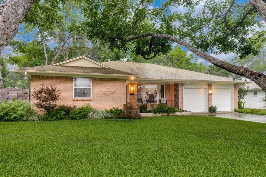 Renovated ranch sitting on a tree lined creek in East Dallas. Welcome to this beautifully updated, move-in-ready home. Major renovations have been completed, including a new roof installed prior to closing and fresh paint throughout.The heart of the home is the chef-inspired kitchen (2017) featuring Thomasville Custom Alder Hardwood Shaker Cabinets, Corian countertops, Pendant lights, Elkay Stainless Farmhouse Sink, and modern wood-like tile flooring. The space is equipped with stainless steel appliances, including a Samsung Gas 5-Burner Cookstove with Convection Oven and a stainless steel hood vent and LG Microwave installed in the island. Enjoy luxury and convenience in the recently renovated bathrooms. The Jack and Jill Bath (2024) is a standout with a custom black shaker vanity, quartz countertop, black and gold hardware,  tile shower enclosure with a glass door and a Bluetooth vent with lights and music. The Hall Bathroom (2021) features a blue tile shower enclosure with glass door, white shaker vanity, quartz countertop, and additional cabinetry for storage and floating shelves. Other features include: Oak Hardwood Floors, Recessed lighting, Rinaai Tankless Hot Water Heater (2015), Sewer Line Replacement (2015), formal dining area with a skylight, Walk-in Pantry and a dedicated laundry room with cabinets and shelving. The garage has tons of built in shelving and a workbench.  Exterior amenities include a wood deck overlooking the creek and backyard, established perennial landscaping, St. Augustine grass and sprinkler system. The French doors and Kitchen door lead out to the deck and backyard, connecting indoor and outdoor living.This home flawlessly blends classic charm with modern amenities. Excellent location with an appealing neighborhood vibe. 1 mile from White Rock Lake and just 6 miles from downtown. Nearby areas include Lakewood and Casa Linda for shopping and dining. Schedule a tour today!