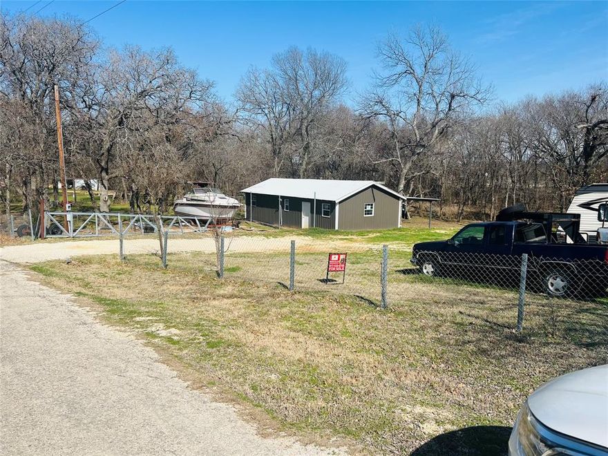 Absolutely RARE Approximately 1.48 Acres with a Metal Shop on a slab and Two Metal carports just minutes from I-35W with access to the frontage road and also access off Quail Haven. Could be commercial verified with the City of Alvarado.