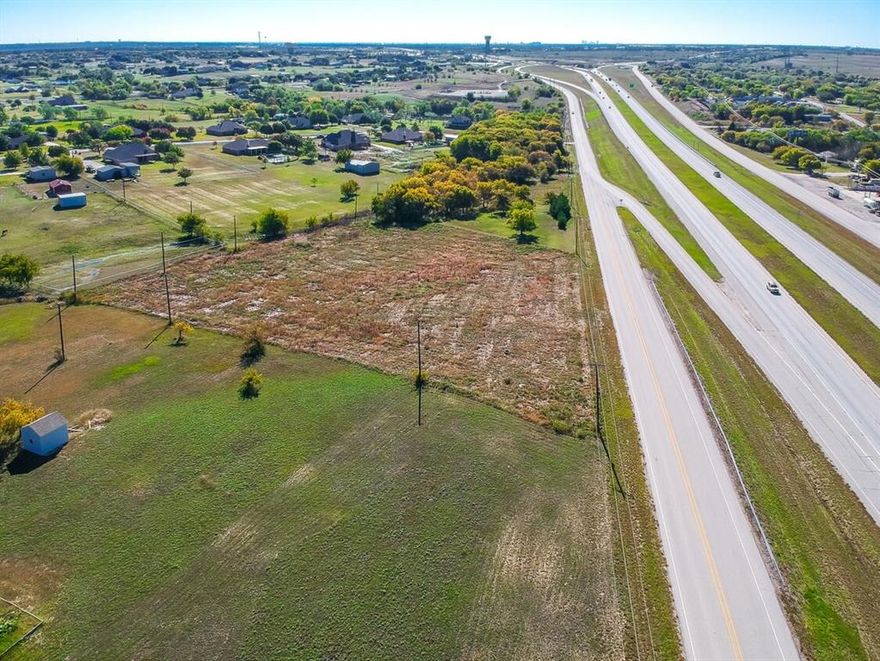 Amazing and rare development opportunity off the service road of US 287! This 3 acre parcel provides easy access to highways, is zoned to Northwest ISD, and is in close proximity to entertainment, shopping, dining, etc.