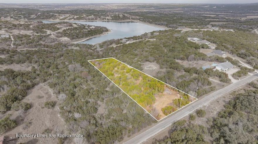 Beautiful 3-acre property located in the heart of Mountain Lakes Ranch. Partially cleared at the front, offering an ideal building site while maintaining privacy and natural surroundings. Conveniently located close to all subdivision amenities, making this a great opportunity to enjoy both space and community living. Water and electricity available at the front of the lot. No build time requirement and a 1,400 sq. ft. minimum living space. Annual assessment is just $295. Located in Bluff Dale, Texas—perfectly situated on Hwy 377 between the Cowboy Capital of the World, Stephenville, and the historic town of Granbury. Come experience breathtaking Texas sunsets, star-filled skies, and abundant wildlife. Mountain Lakes amenities include a recreational lake, fishing lake, clubhouse, pool, park, walking path, garden, and RV park—country living at its finest!