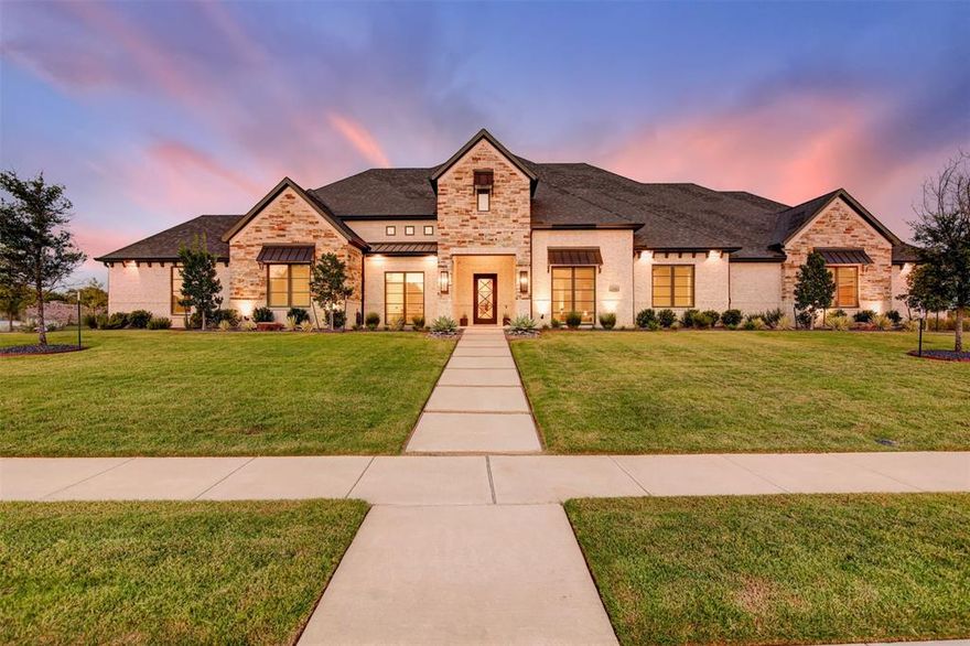 Transitional ranch style custom home in Lakeside at Mustang Lakes. Expansive corner lot in Prosper ISD. Traditional ranch exterior with modern finishes. Hardwood floors, 12 to 15 ft ceilings, and to-the-floor windows accentuate the open living area. Shutters provide privacy in the front. Sliding doors connect indoor to outdoor living and enhance the view of swimming pool and outdoor entertaining space. Electric shades on entire patio. First floor living with upstairs guest suite. Kitchen finishes include stunning backsplash, quartz countertops, Subzero and Wolf appliances, double oven, and massive working pantry with secondary sink, nugget ice machine and microwave. Wet bars in butler pantry and media room. Relax in huge walk-in shower or soaker tub. Master closet connects to oversized utility room. Media room, office, game room, 3 secondary bedrooms downstairs. 4 car garage and plenty of backyard to expand this entertainer's paradise among ponds, trails and community amenities.