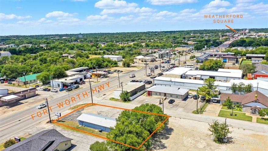 Great opportunity to purchase a corner lot on one of the busiest roads in Weatherford.  Building is lease ready, with 2 suites each with their own bathroom and ac units.  A third space could be rented out as well.  This could make a great office for multiple businesses, or a staff one whole business with multiple spaces and room to hold all employees. PRIVATE FINANCING AVAILABLE. Ask agent for details.