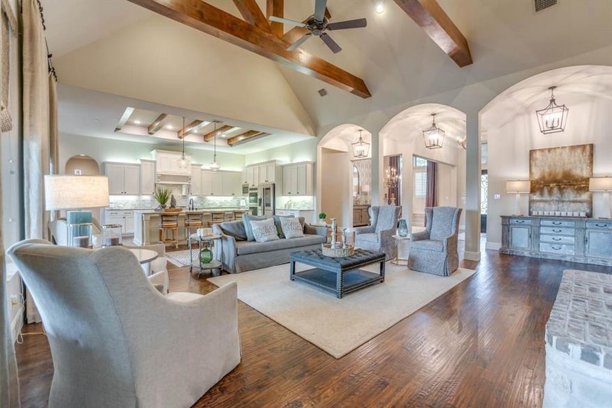 Stunning Home in Lovejoy ISD on 1.5 Acres. Open Floorpan with Hardwoods. Vaulted Ceilings, Wood Beams & Custom Drapes. Large Kitchen with Island, Granite Counter Tops, Gas Cooktop, Double Ovens and Refrigerator. Master Suite with Plantation Shutters, His and Her Vanities, Garden Tub and Oversized Shower. Huge Master Closet with access to Laundry. Guest Bedroom with Ensuite Bath. Secondary Bedroom with Ensuite Bath and walk in Closet, 2 Additional Bedrooms with Jack and Jill Bath, Walk in Closets. Built in Study Area. Game Room with Beverage Area, Granite Counter Tops, Sink and Bev Fridge. Media Room with Projector and Screen. Upstairs Bonus Space perfect for kids play room or additional media room. Full Bathroom with Shower, Beverage area with built ins, granite countertop and sink. 18 x 12 room with privacy pocket doors would make a great additional bedroom. Outdoor Living with Fireplace, Outdoor Kitchen, Pool with Rock Water Feature and Stone fire pit with seating. Foam Insulation