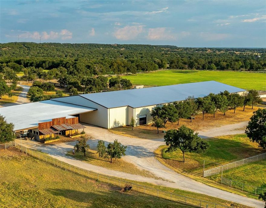 Lush green pastures, sandy loam soil, cool, innovative improvements and well designed working pens are just a few of the many qualities you'll find a this Parker County, Texas facility.  Placed just south of garner, this one of a kind equine property is a ranch-owner's dream.  The 58.4 acre property features a thirteen stall tilt wall show barn, connected enclosed 130'x250' multi-use arena complete with roping boxes, working pens, and electric drop fence system to conveniently divided for working cutting horses, 160' lighted round pen, covered round pen, 10 oversized covered outdoor runs, hay commodity barn, help quarters, two mobile homes, multiple cross-fenced pastures, gated entrance, pipe fencing, loading working pens, covered storage, covered trailer parking and much more.  Meticulous buyers don't want to miss the opportunity to tour this special property if owning a special piece in the heart of horse country is a necessity.
