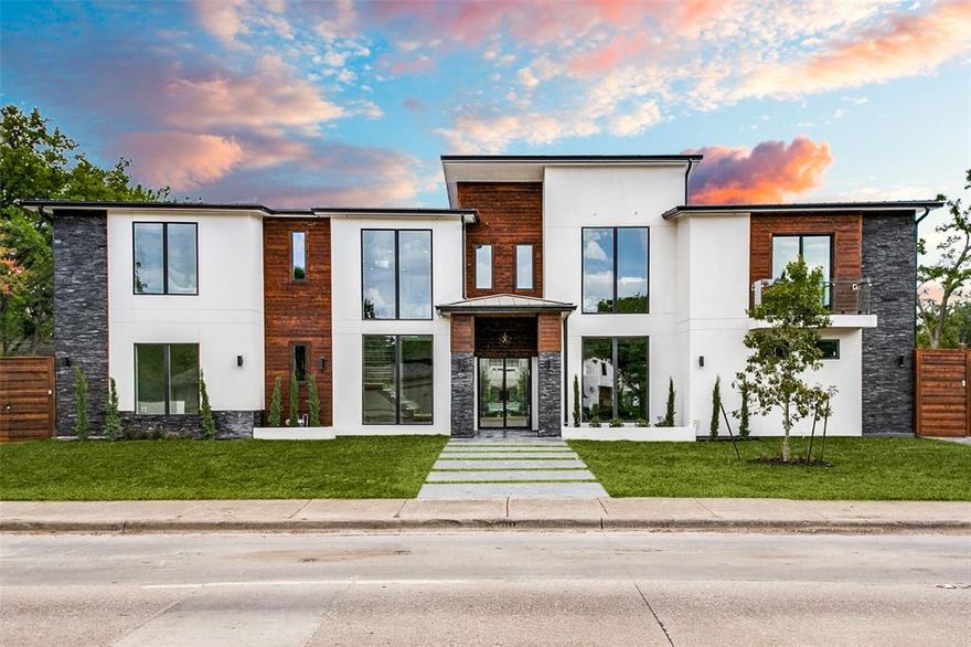 Gorgeous modern, 7 bedroom, 6 bath home on one-half acre. Putting green, luxury finishes, media room, open floor plan. Stunning. Pool with water feature, board on board horizontal fence, motorized electric gate, large parking pad.
