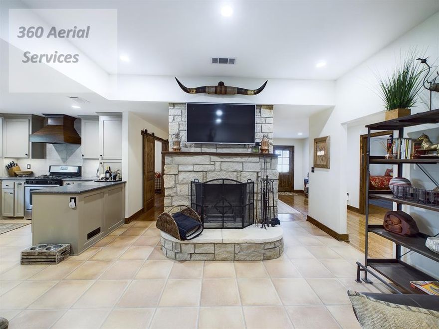 Home was completely remodeled in 2019 & has hardwood oak floors & laminate tile. Beautiful knotty alder wood doors & trim  and recessed lighting make it seem like there's a ton of natural light. There are 3 bedrooms, 2 baths with walk-in showers, an office, a sitting or reading room & then of course dining, kitchen & living room with a wood burning stone fireplace. Home is well shaded from the summer sun by large mature Elm, Pecan and Oak trees. Land consists of approx 110 acres in Coastal Bermuda grass (generally produce 2 cuttings per year at 2-3 bales per acre), approx 88 acres in cultivation, 165 acres in native pasture & 290 acres that are heavily wooded which are scattered around the property.  Sabana River meanders through the south half of the property which allows for wildlife habitat galore. 30x50 Metal Shop beside the house with concrete floor & 20 ft overhang, 30x70 Metal & Wood Pole National Barn with gravel floor & Older equipment shed. Some furnishings negotiable.