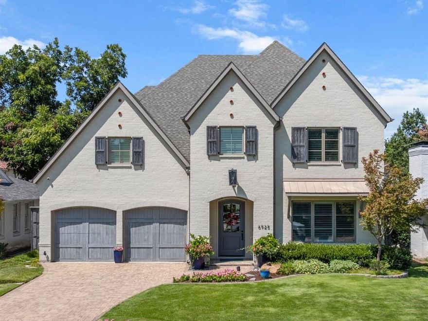 Crafted by Newport Custom Homes, this exceptional Lakewood residence combines timeless elegance with modern functionality. Designed for both everyday living and memorable entertaining, the home offers multiple gathering spaces, including a sunlit living room with custom built-ins and a gas fireplace, and an upstairs family room featuring built-in cabinetry for added storage and style. At the heart of the home, the eat-in kitchen is a chef’s dream, showcasing soapstone and marble countertops, a spacious island, and an inviting breakfast nook. Top-of-the-line stainless steel appliances—including a Wolf commercial range and built-in SubZero refrigerator—make cooking and entertaining effortless. Rich hardwood floors and striking designer lighting flow seamlessly throughout the home, while integrated surround sound and smart home technology provide a sophisticated, turnkey living experience. The downstairs primary suite provides a serene retreat with vaulted ceilings, a spa-like bath featuring a soaking tub, stand-alone shower, dual sinks, and a custom-designed closet. A downstairs study with built-in cabinetry offers the perfect work-from-home environment. Step outside to discover a backyard oasis designed for year-round enjoyment. A covered patio with fireplace and ceiling fan sets the stage for outdoor dining, while the new pool and hot tub invite relaxation. The fully turfed yard, sitting area with built-in fire pit, sprinkler system, and board-on-board privacy fence complete this thoughtfully designed outdoor retreat. Zoned to Lakewood Elementary, this is your opportunity to own a stunning home that blends luxury, comfort, and convenience in one of Dallas’s most sought-after neighborhoods.