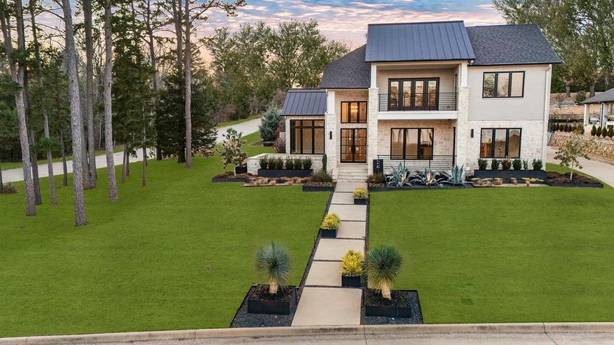 Exceptional Custom Lakeview Estate just moments from Bellwood Lake. This extraordinary custom-built residence redefines modern luxury living, offering approximately 5,280 sq ft on nearly half an acre. Featuring 5 bedrooms and 5½ baths, this rare offering blends architectural sophistication with resort-style comfort. Soaring ceilings and expansive windows flood the interiors with natural light, creating an inviting yet impressive atmosphere designed for both grand entertaining and everyday living. A dramatic floor-to-ceiling fireplace anchors the main living area, while the formal dining space provides an elegant setting for hosting. The chef’s kitchen is the heart of the home, complete with premium appliances, custom cabinetry, an oversized island, and seamless flow into the living and outdoor spaces. The private primary suite is a true retreat with a spa-inspired bath and generous walk-in closet. Each additional bedroom features its own en-suite bath, offering privacy and comfort for family and guests. Expansive outdoor living areas provide the perfect backdrop for relaxation and gatherings, all just moments from the beauty and recreation of Bellwood Lake. A rare opportunity to own refined lake-area luxury.