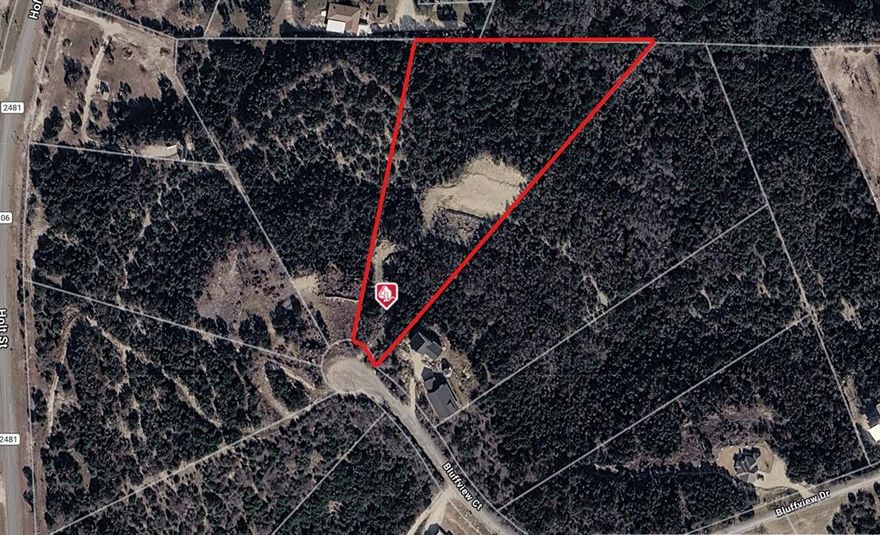 Discover an amazing property nestled in the heart of Texas. This exquisite 5-acre lot, partially cleared, offers stunning vistas and is ideally situated near the town of Bluff Dale. Envision the limitless possibilities as you plan and construct your dream home. The property is graced with an abundance of majestic shade trees, providing an ideal blend of privacy and natural beauty. Additionally, the surrounding area offers a wealth of amenities including a nearby lake, boat ramp, RV park, and pool, all nestled within this exclusive subdivision.