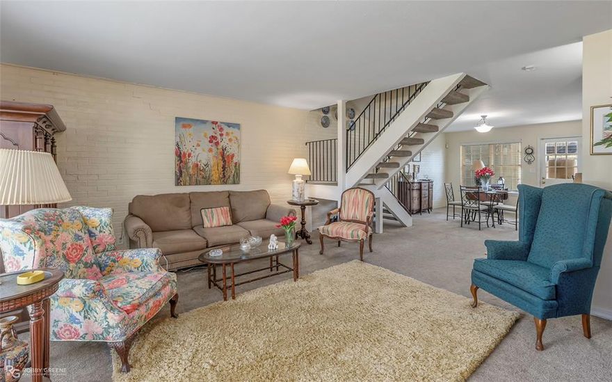 Motivated Seller....Great location close to shopping, restaurants, schools and hospitals.  The open floor plan will be well enjoyed by all-living , dining and kitchen with Corian counters and eating bar. Great storage throughout, AC 2022, roof 2013, balcony, private patio and two-car carport. Village Green HOA includes pool, tennis court, lawn, pest preventative spraying interior and exterior, water, trash, sewer, scheduled painting and power washing. BONUS appliances included are refrigerator, washer and dryer.