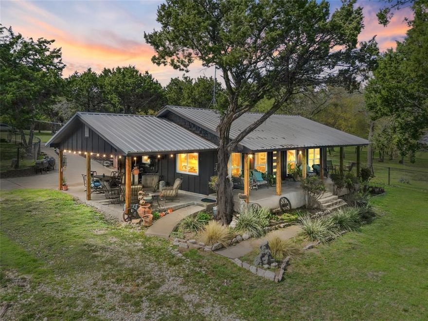 Country Lake Living at its Best! This Lake Whitney property has it all!  This gem is perfect for full timers or those that just want a short drive from DFW to relax in the country and enjoy lake life! Lots of room to spread out and enjoy the lake views, swim in the lap pool, plant a garden, work on your hobbies in the shop-garage or play in the big yard with the kids and grandkids.  Lake access is a short walk or golf cart ride to swim and explore the lakeshore.  Beautiful wildlife including deer visit the area every evening.  This 2 bed, 2 bath ranch house is renovated and ready for you to enjoy.  The large living area has a brick fireplace, vaulted ceilings and wood floors throughout.  The dining area holds a table for large family gatherings or take the party outside for even more room and lake views.  The 25 x 25 shop garage with attached carport is perfect for storage and hobbies.  Fenced in yard for pets keeps them secure and part of the fun.  The large lap pool is perfect for cooling off on hot days or letting the grandkids swim.  Renovations in the past five years include a complete solar system that will be paid for free and clear and transferred to new owners for maximum energy efficiency, exterior paint, interior paint, granite countertops, new kitchen sink and faucet, new stove and microwave, new dishwasher, new flooring, privacy fencing on side of yard, fenced rear yard, added shop, garage, carport, new windows, new front and back doors, cedar post on front porch, new light fixtures and fans and new hot water heater. Some of the furniture and appliances are negotiable for purchase.  This place is ready to go for maximum fun and enjoyment.  It will surely go fast so don't miss your opportunity to have that special country lake getaway!