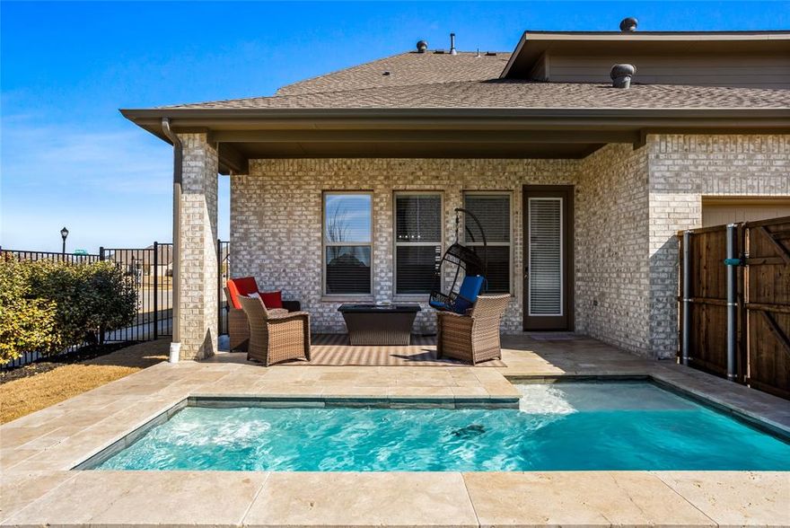 UP TO 1% LENDER CREDIT available for conventional, FHA, VA loans which can be used to provide a 12-month introductory interest rate 1 % BELOW market when using the preferred lender.Is there a 4-bed home in Frisco TX with a pool, greenbelt views, and smart features? This 2021-built home in Villages of Creekwood offers 3,278 sqft, a private backyard retreat, and flexible living spaces near top-rated Little Elm ISD, built for both entertaining and everyday comfort.

Welcome to 8597 Amethyst Lane, where modern design meets a lifestyle you will actually use. From the moment you enter, the open layout draws you in, connecting the kitchen and living area into one inviting space centered around a fireplace. The kitchen is built to gather, featuring a large island, gas cooktop, pantry, and breakfast bar that makes hosting feel effortless.

Working from home is easy with a dedicated private office on the main level, while upstairs opens up to a spacious game room and a true media room ready for movie nights, game days, or quiet escapes.

The primary suite offers a comfortable retreat with dual sinks, a separate shower, and a generous walk-in closet. Additional bedrooms provide flexibility for guests, hobbies, or growing needs.

Step outside and the experience shifts into a private backyard oasis. The pool with a waterfall feature creates a resort-style setting, while the covered patio and greenbelt views add both privacy and a peaceful backdrop for relaxing or entertaining.

Additional features include smart home systems, central air, a rear-entry garage with EV charger setup, and access to community amenities.

Located in Villages of Creekwood within Little Elm ISD, you are minutes from parks, dining, and major routes, making daily life as convenient as it is enjoyable.

If you are searching for a 4-bed home in Frisco TX with a pool, smart upgrades, and flexible space, this home delivers the balance of function, comfort, and lifestyle.