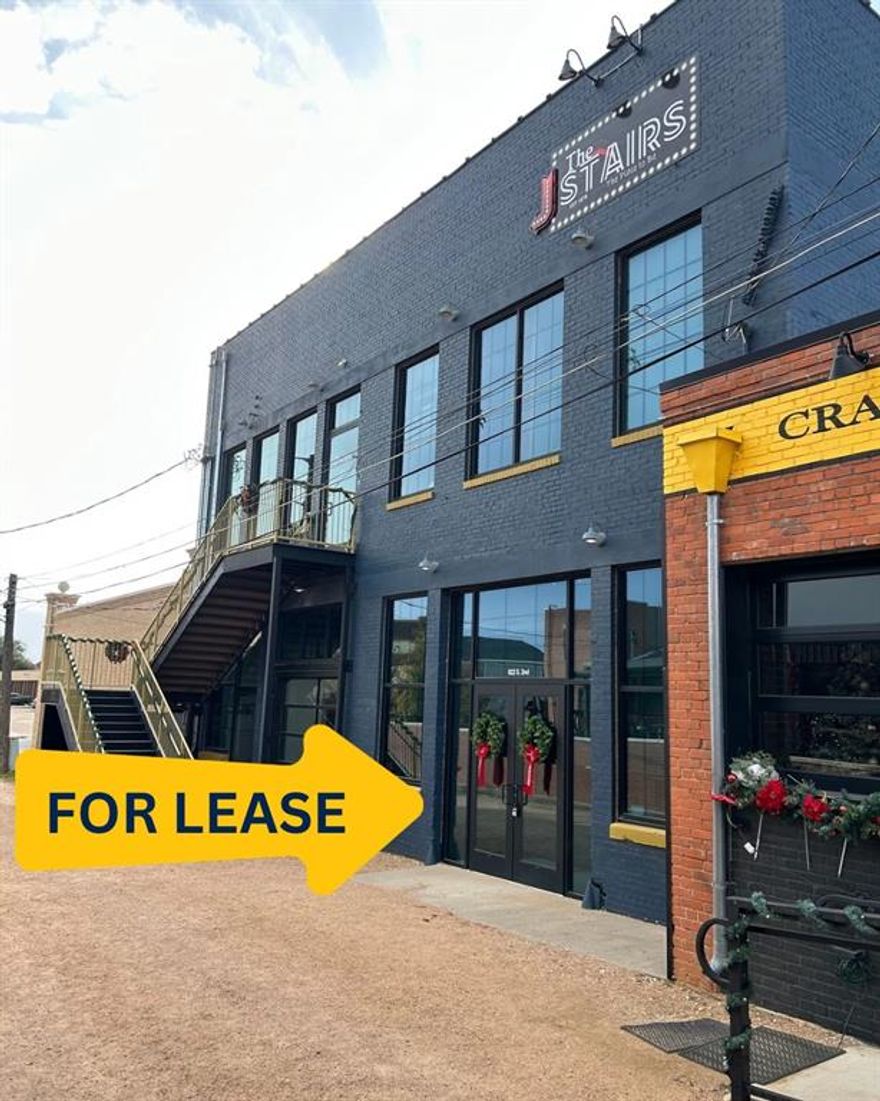 This beautiful building was completely renovated several years ago & awaits the right concept! Original brick walls, stained concrete, charming storefront with glass overhead door and ready to go ADA compliant restrooms are some of the key features of this unique space. The possibilities are endless for this 3,375 square foot space located in the heart of the SODA District next door to KAO Lounge, below The Stairs and across from the new, full-service restaurant called Big Country Beer Garden. Nearby at 833 South 1st, Angry Cactus Bar & Grill is about to break ground for a large restaurant estimated to open in Spring of 2026. This will be a tremendous anchor for the area! Other nearby businesses include SODA District Courtyard, Oak Street Arbor Venue, The Mill, Amendment 21, Oak Street Shoppe, Prep Academy Dance Studio, Abilene Axe Company, Primal Brewing Company and Fromage & Honey. 

Join the growing synergy and bring this space to life with your concept! Retail or office possibilities are endless! Restaurant, bakery, event venue, martial arts studio, entertainment concept, fitness center or yoga studio are just a few other concept possibilities for this versatile space!