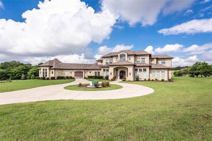 Luxurious Custom home in beautiful Fairview! Elegant entrance with Magnificent dual stairway and Juliette balcony. Great room w dramatic floor to ceiling stone fireplace and two story windows adjoins the gourmet kitchen. Prof. grade appliances w 6 burner gas cooktop, double ovens, and builtin frig, pot filler, wrm drawer and more! Stone wine room off the media and secondary stair leads to gameroom w outdoor patio. Spa inspired master with wlk in shower, fireplace and his~hers wlk in closets. Secondary mstr down w wet bar and ensuite. Work out room + utility with pet shower. Sound and security. Porte Cochere + split 4 car garage. Outside patio with built in grill and fireplace overlooks the expansive property.