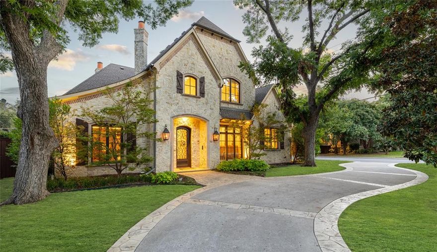 Situated on a corner lot in highly sought after Preston Hollow, this timeless home seamlessly blends sophistication & comfort. A grand staircase greets you opposite private dining that continues through the wet bar & butler's pantry to the eat-in kitchen boasting Sub Zero fridge, 2 dishwashers, wolf range, bev fridge & walk-in wine room. Formal living room can double as a substantial second office. Expansive main living area flows outdoors to a custom screened porch with fireplace, TV & outdoor kitchen. It is the ideal place to unwind & sip your morning coffee or host fireside al fresco dinners overlooking the turfed & landscaped backyard without interruption. Also on the main level, tucked away is a large primary retreat featuring his & her's baths & closets plus additional guest room with ensuite bath. 2nd floor hosts 2 additional bedrooms with ensuite baths, open family room plus a game room which could easily serve as a 5th bedroom. 3 car garage & elevator add to the convenience!
