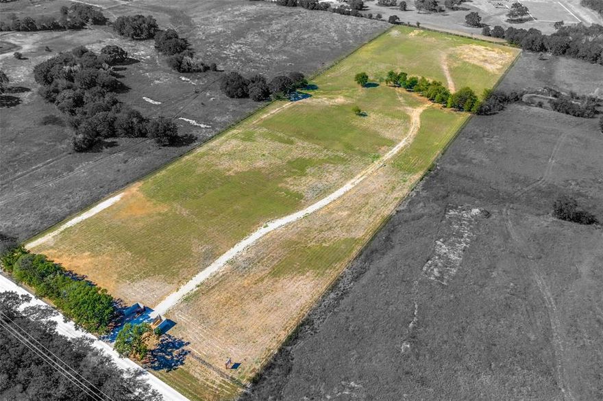 Discover your ideal canvas at 999 E Hickory Hill, situated in the heart of Argyle Texas. This stunning 11 acre property features beautiful treed landscapes and over $800,000 in improvements have already been completed. With 400 truckloads of dirt brought in for grading and drainage, the site is primed for building. All mesquite and ailing trees have been removed, and remaining trees trimmed. The property is fully enclosed with $312,000 of pipe fencing and features a grand double entry valued at $35,000. This property is currently under an agricultural exemption for beekeeping, resulting in an incredibly low property tax of just $14 for the current year. Conveniently located near Hilltop Elementary (1.8 miles), Argyle Middle School (2.5 miles), Argyle High School (5.3 miles), and Liberty Christian School (4 miles).Seize this opportunity to create the lifestyle you’ve always envisioned in Argyle. Come and make it yours today!