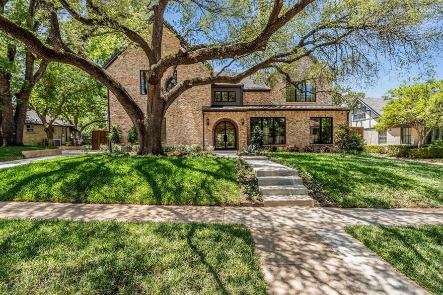 Elevated luxury in this exceptional new construction home, on highly coveted Stadium Drive - just steps from Colonial Country Club and TCU. The main home spans 6,142 SF and features 5 bedrooms, 5 full bathrooms, and a half bath. The pool house - guest suite offers an additional 632 SF of living space. Thoughtfully designed by renowned interior designer Jessica McIntyre, the home showcases modern elegance and warm natural textures. The expansive living room impresses with vaulted wood-beam ceilings, wide-plank oak floors, and a wall of glass doors that create a seamless connection to the outdoors. The kitchen is both beautiful and functional, featuring professional-grade appliances, a waterfall island, designer lighting, and custom cabinetry. Just off the kitchen, a walk-in pantry that includes extensive storage, prep space, a wine fridge, microwave, dishwasher, and a secondary sink. The private first-floor primary suite is a true retreat with vaulted ceilings, hand-finished clay walls, floor-to-ceiling windows, and French doors overlooking the pool. The spa-inspired ensuite bath offers a soaking tub, glass-enclosed shower and an oversized custom walk-in closet with dual islands and built-ins. A laundry room is conveniently attached to the closet. The home office with custom built-ins and oversized windows is complemented by a hidden lounge—accessed through a secret bookcase door. Outfitted with a wet bar, this tucked-away space also connects to the primary closet. Upstairs, 4 additional bedrooms, 3 full bathrooms, laundry room, and a game room complete with wet bar. Outdoors, enjoy a private backyard featuring a sparkling pool and spa surrounded by artificial turf, covered patios for entertaining, and an outdoor living and kitchen space with a fireplace. The pool house offers an open living area, kitchenette, full bath, and a flexible room perfect for a gym, sauna, or guest bedroom. Additional highlights include a sauna a three-car garage and motor court.