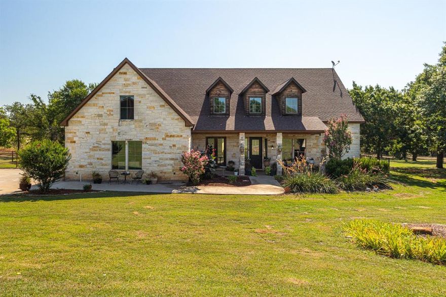 Motivated seller. Beautiful landscaped home in Sherwood Forrest on 6.97 acres.Walk into open concept, vaulted ceiling in living room, with corner wood burning fireplace to ceiling. New carpet in living room and office, with hand scraped wood floors and travertine floors in kitchen with granite kitchen countertops. Eight foot doors throughout the house. Master and guest bedrooms are downstairs, with two full baths downstairs. Upstairs walk into a loft area, with three bedrooms upstairs, two more full baths, a media room and wet bar area in loft. Lots of attic storage access from upstairs. There is a shop with electricity, concrete floor, RV hookup, septic. Quiet country living with beautiful sunsets to view and lots of natural light in this home. Come see!