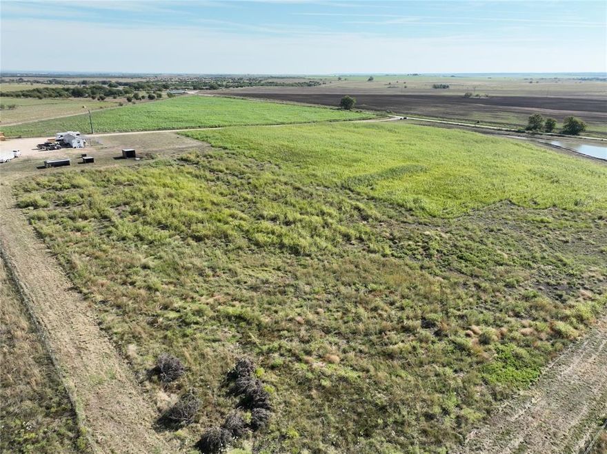 Charming Tiny Home on 12.5 Acres – Perfect Weekend Getaway or Future Homesite

Escape to the country with this 12.5-acre property just outside of Hico, TX. Offering wide-open views and a producing sudan field, this tract combines rural charm with modern convenience.

A cozy 2-bedroom, 1-bath tiny home sits on the property, complete with a mini split for cooling and a mini wood-burning stove for warmth. The home also includes a tankless hot water heater and comes with optional appliances—washer, dryer, refrigerator, stove, and Blackstone griddle—for a truly turnkey setup.

The washer dryer room is housed in a separate building, adding extra function and storage space. A strong water well and pump system is already installed and set up to support a future build, and there’s an RV hookup for added flexibility.

The property is fully fenced with good fencing all the way around, making it ready for livestock or simply peace of mind. Whether you choose to live in the tiny home while you build your dream house, keep it as a weekend retreat, or use it for recreational purposes, the groundwork has already been laid for your plans.
