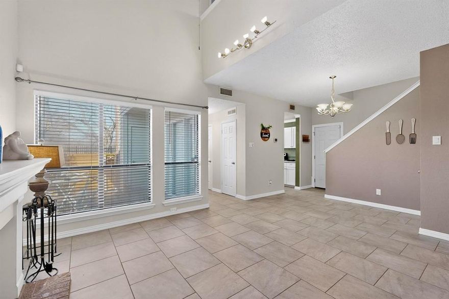 Step into modern comfort in this beautifully renovated 1-bedroom, 1.5-bath townhome-style condo. Located in the gated Forest Point community, Unit #1305 is a rare end-unit, offering extra privacy and an abundance of natural light that its neighbors lack.

High-end granite countertops, custom glass tile backsplash, and stainless-steel appliances. A dedicated utility closet is conveniently placed, featuring connections ready for a stackable washer and dryer. The open-concept lower-level features durable ceramic tile and a wood-burning fireplace—perfect for cozy Dallas winters. Escape to the second floor where a spacious primary suite meets versatility with freshly installed carpet. The adjacent loft is your new dedicated home office, creative studio, or reading nook. Enjoy a fully remodeled primary bathroom featuring custom tile work and a generous walk-in closet.

Forget the commute. You are a 5-minute walk from the YMCA recreation center, the Forest Lane DART station and seconds from the Texas Instruments campus and Medical City. With instant access to US-75 and I-635, the best of NorthPark Center and Park Lane dining is just a short drive away.  Gated security for peace of mind. Two assigned covered parking spaces and sparkling community pool just steps from your front door - a MUST SEE! End-unit quality meets high-yield potential—an ideal move-in ready home and or an excellent income-producing investment.