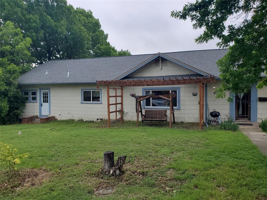 Location, location, location! Do you love small-town charm? Are you looking for a place to call home and leave the hustle and bustle of city life behind? This home is just two blocks from the acclaimed Decatur town square and one block from a gorgeous city park!

The tax roll says built in 1948, but this home is closer to 100 years old. With 4 large bedrooms (currently three bedrooms and an office) and 2 updated bathrooms, there is plenty of room for a growing family. Amazing natural light and large windows (replaced in 2020) abound in this residence. The flooring was updated in 2025 throughout the house.

The kitchen has gorgeous butcher block counters, new cabinets, and storage abounds, not just in the kitchen but throughout the house. And the dining room? Talk about open space for entertaining!

The yard is a gardener's dream! Metal garden beds will stay; the front is full of plum, pear, peach, apple, and fig trees just waiting for you to pick and eat. The swing also stays, imagine sipping coffee in your front yard and saying hello to neighbors. This house holds all the small-town charm you could ever want and more. Make your appointment today!