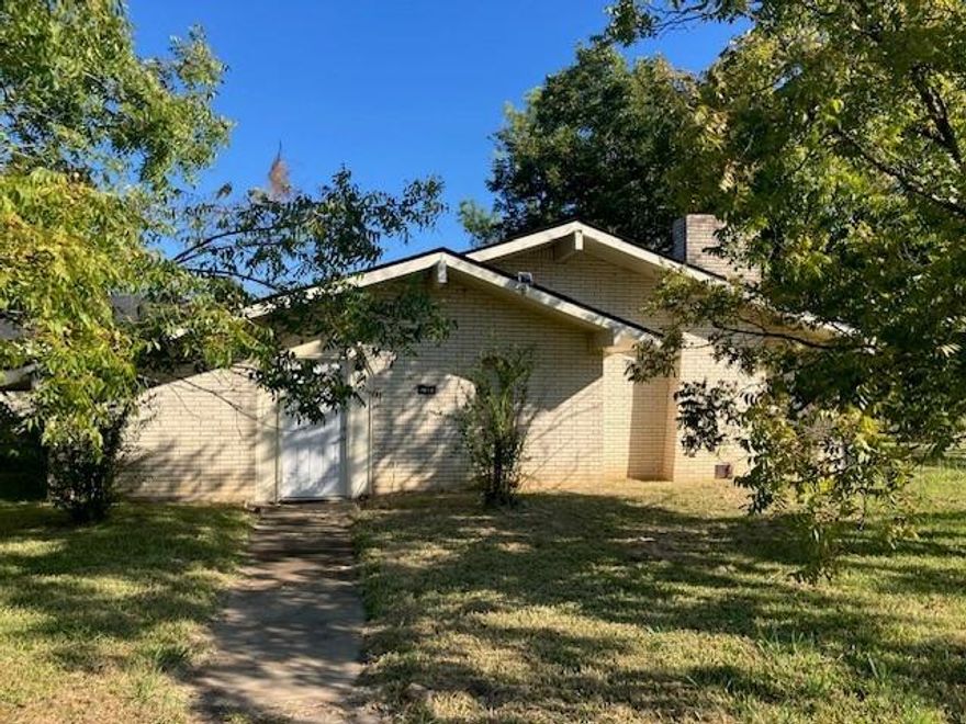 3-bedroom, 2-bath home with a large yard shaded by beautiful pecan trees. Features a 2-car garage and a storage building—plenty of space inside and out.