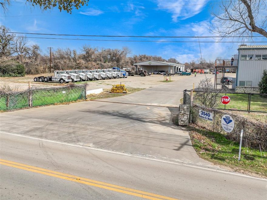 Premier industrial property opportunity!  This 12-acre industrial site, formerly home to a trucking company, is currently zoned under a Special Use Permit and offers significant potential for industrial operations, storage, or further expansion.  The property features two metal buildings, including one equipped with multiple offices and two bathrooms, as well as a large shop and warehouse with another bathroom.  Additionally, a large air compressor and two cranes will remain with the property. Notably, the site has a Voluntary EPA Completion Certification in place, ensuring the land is ready for its next use.  This property is ideal for industrial operations, storage or expansion.